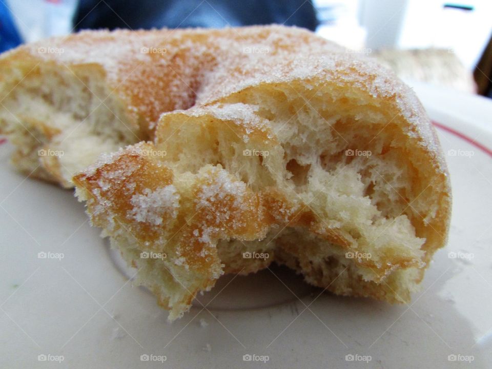 Tasty donut bought from a street vendor