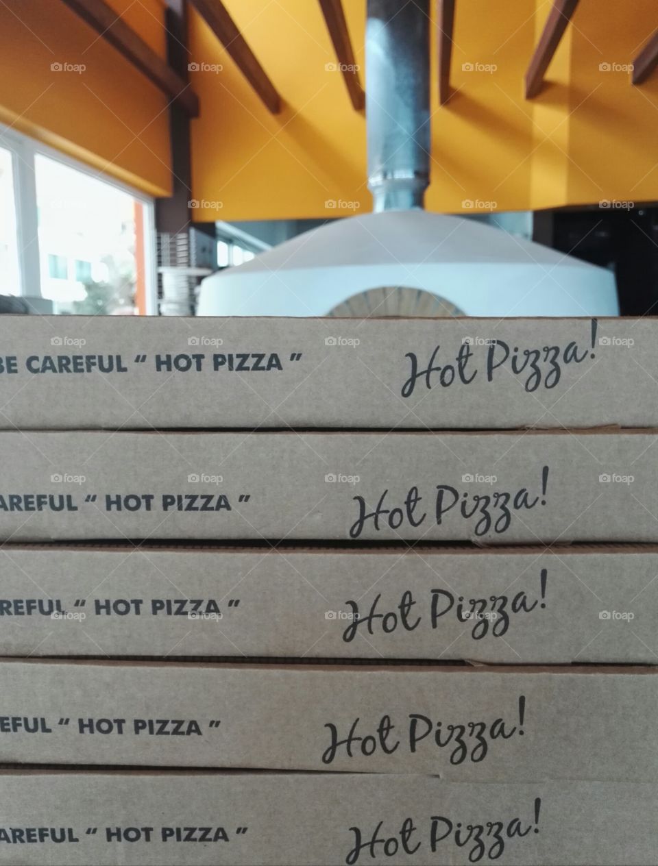 hot pizza boxes and wood fired oven