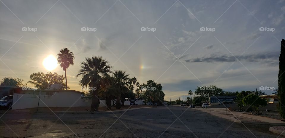 piece of a rainbow with the sun shining