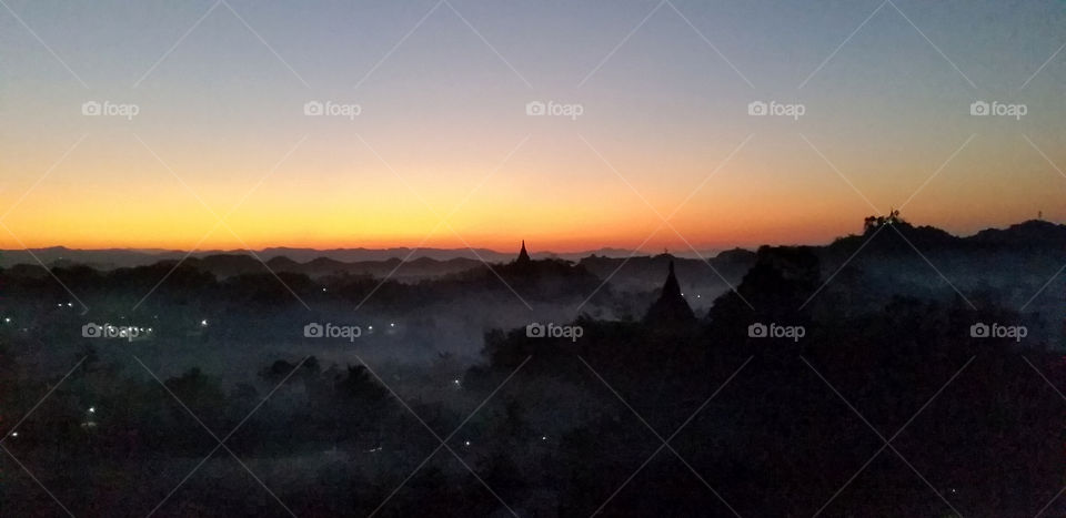 Dawn in Myanmar with fog and light