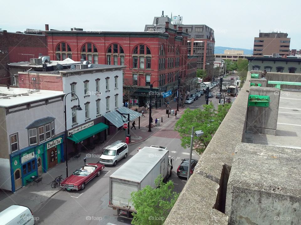 Overview of bustling Burlington, Vermont on an overcast spring day [original photo].