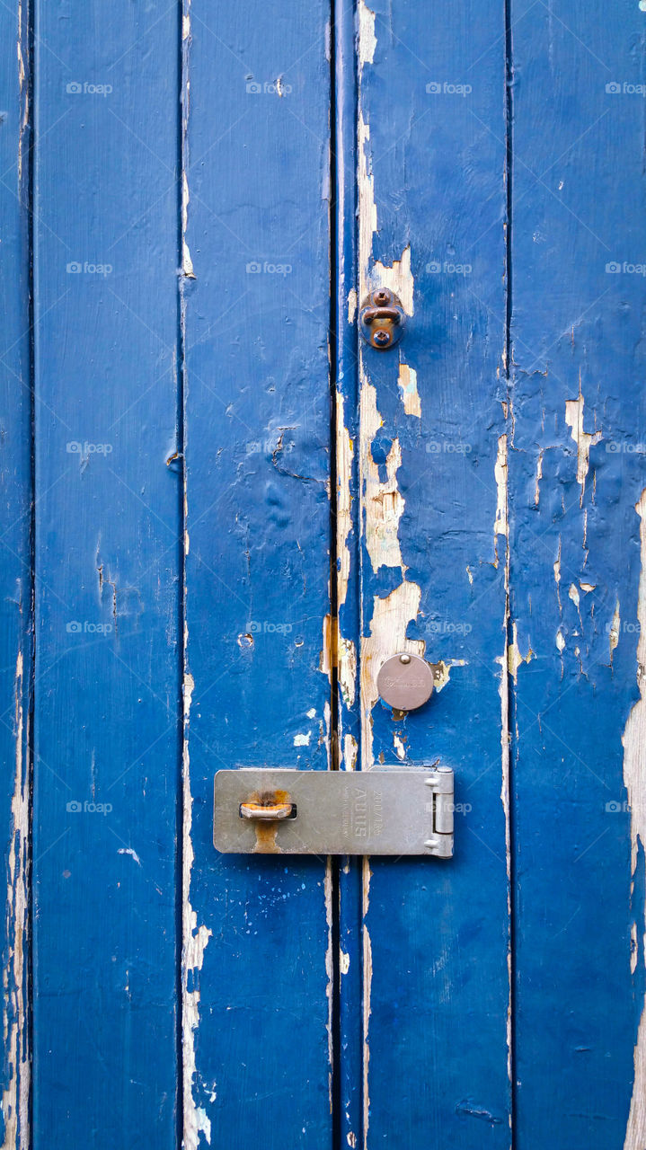 An old door with flaking paint