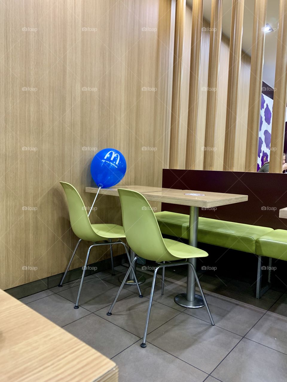 forgotten by someone in a cafe lonely blue balloon