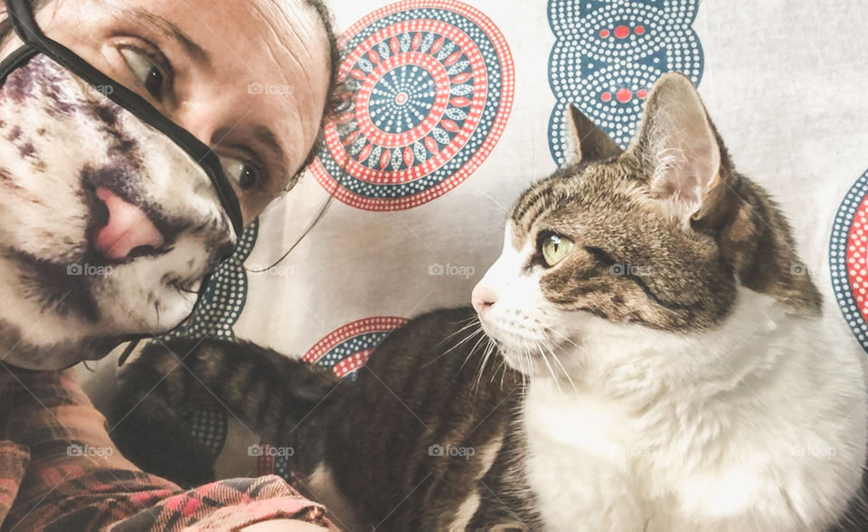 Me and my cat, she looks suitable unimpressed with my cat mask. She’s generally quite unimpressed with all I do. 