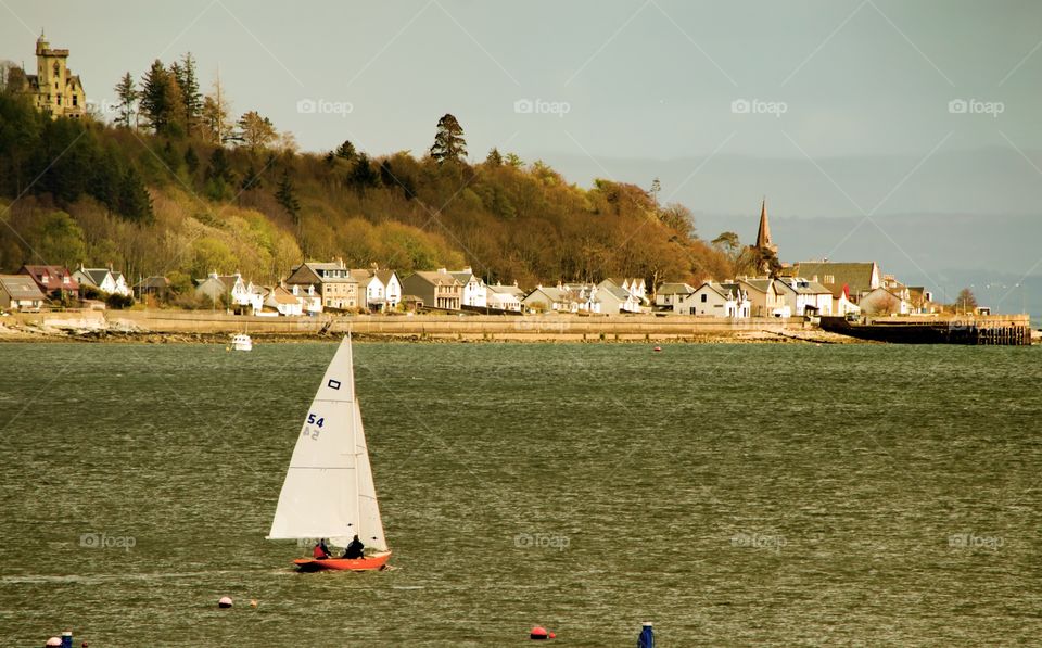 Sailboat sailing in sea