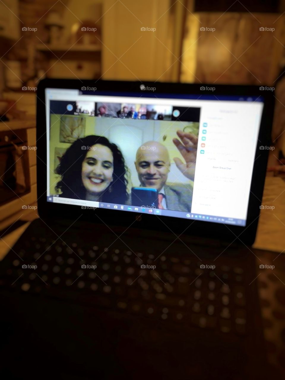 Smiles and greetings to friends in video conference with zoom