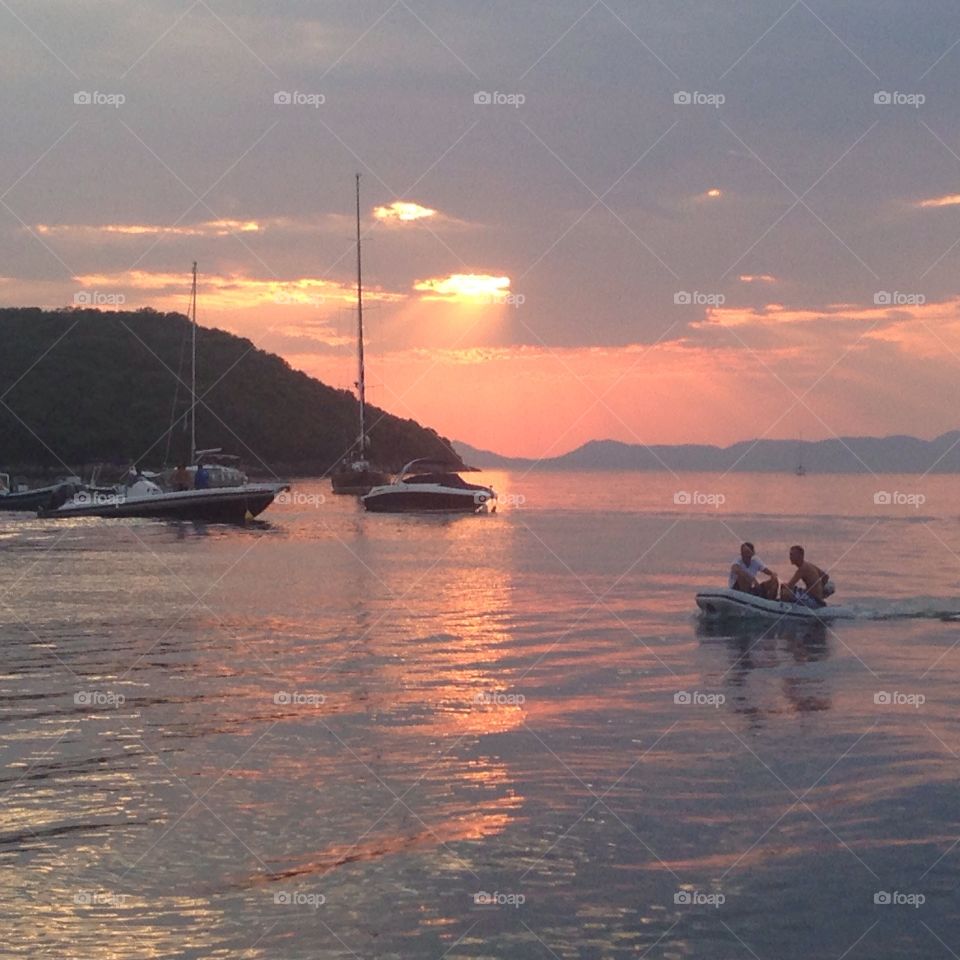 Summer sunsets . Beautiful sunset at Sivota Greece 
