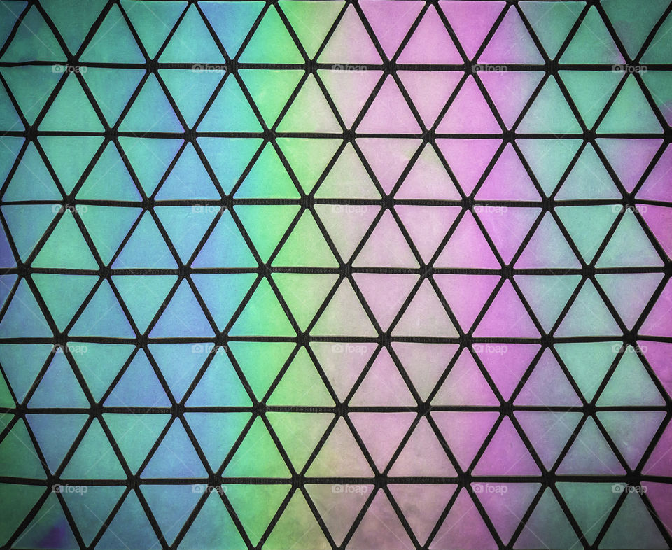 Bright seamless rainbow pattern with in descent on triangles background