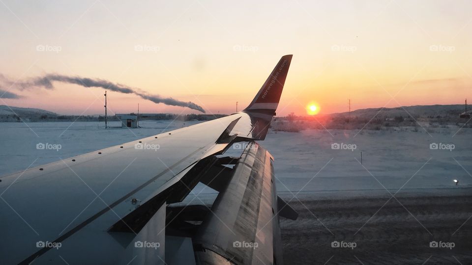 Takeoff in the sunset