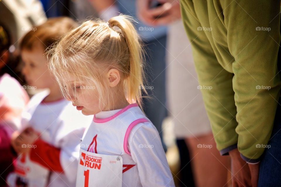 Young girl mentally preparing for her first race.