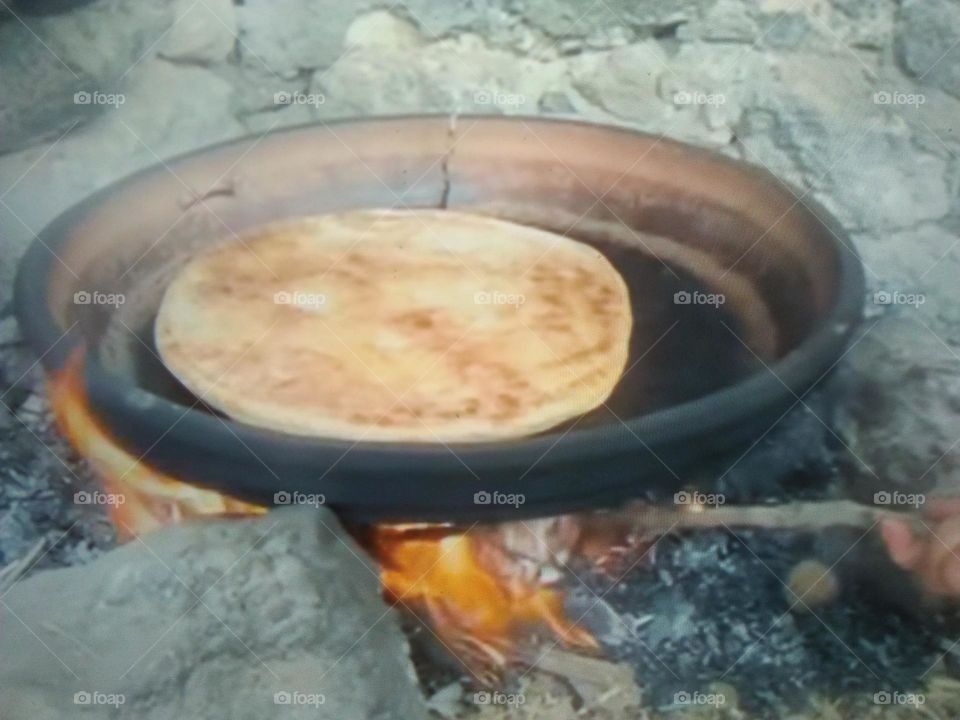  Preparation of  Moroccan bread over the oven.