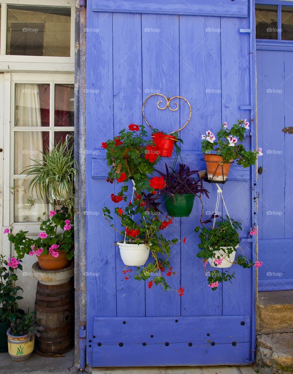 Blue door with flowers