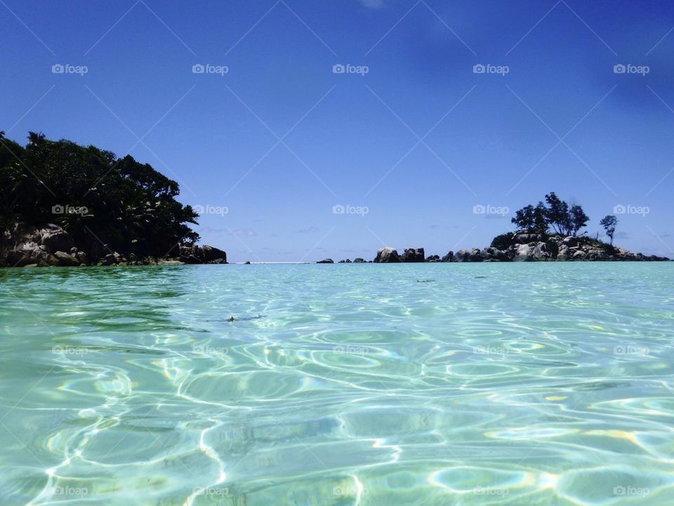 View of sea against blue sky