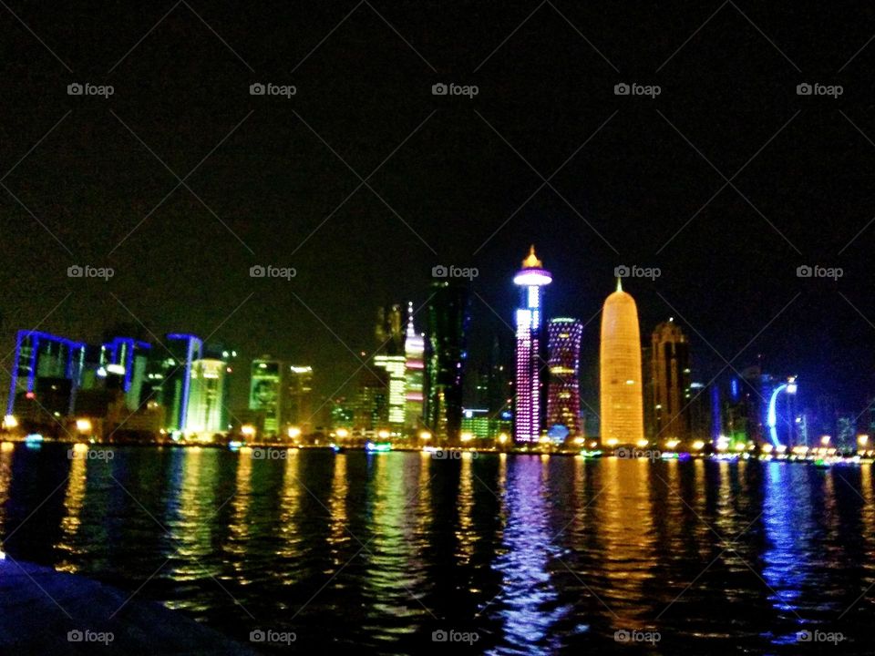 Stunning structures and architectural designs shining at night in Doha, Qatar.