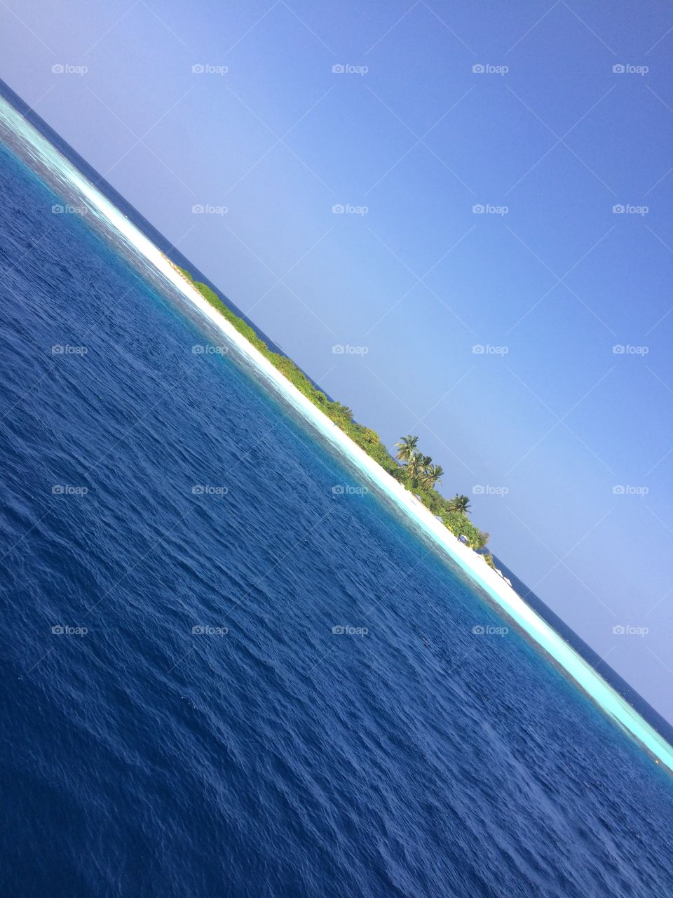 An Island in the Maldives #sun #holiday #maldives #sea #water #sand #palmtree #island #tropic