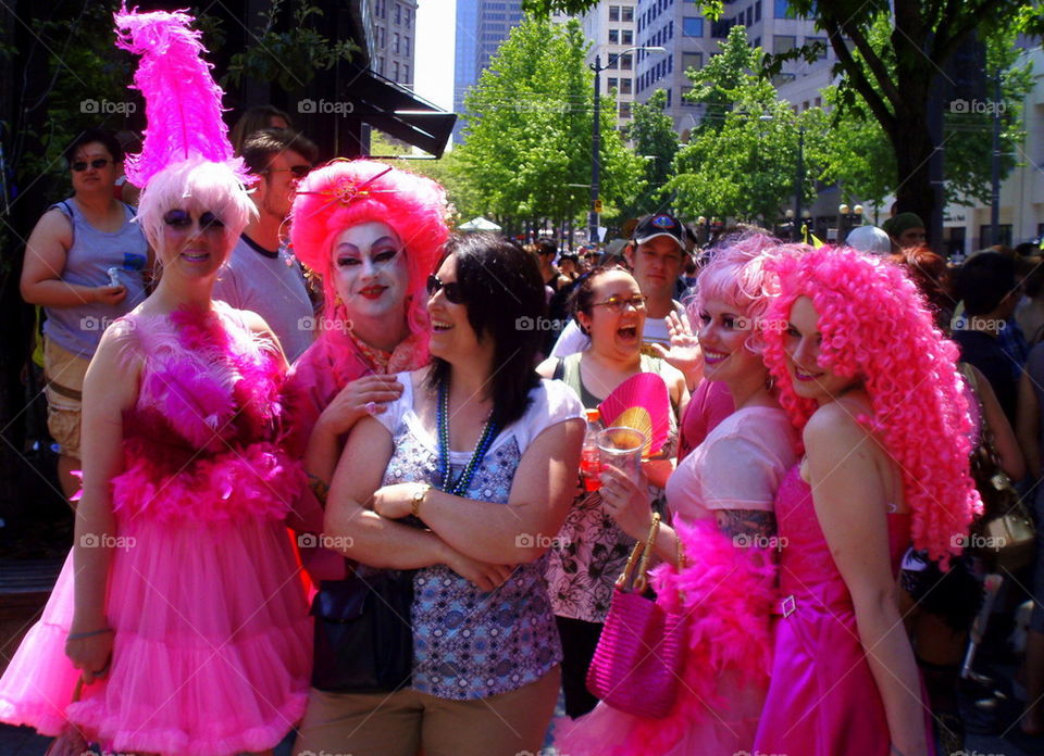 Gay and Straight. Gay pride parade in Seattle Washington. They love to party at this event.