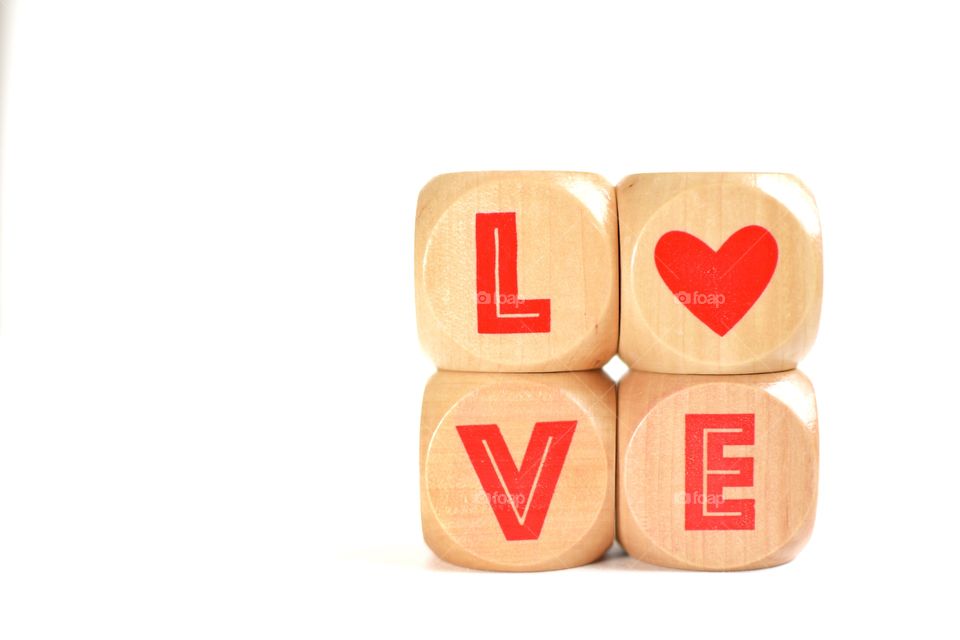 Love text on wooden block