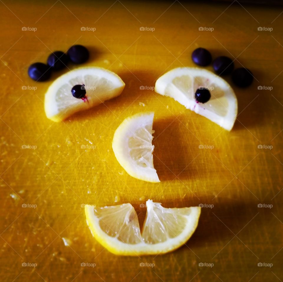 goofy lemon face with blueberry eyebrows!!