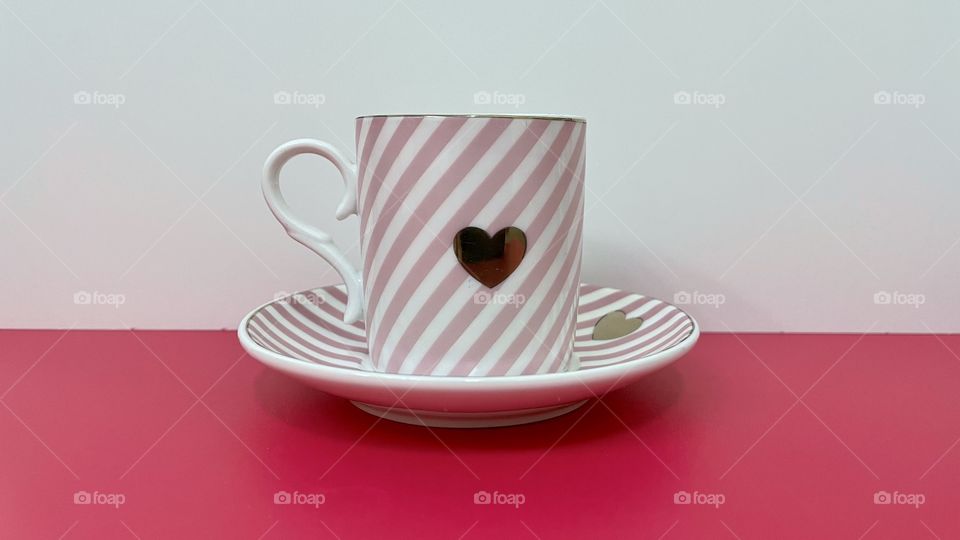 Pink cup and saucer 