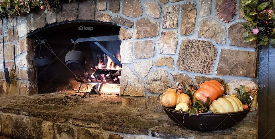 a fireplace full of fire.