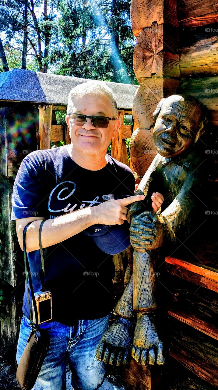 Self-portrait in the city of wooden sculptures. (Lithuania, Druskininkai, July, 2019).
