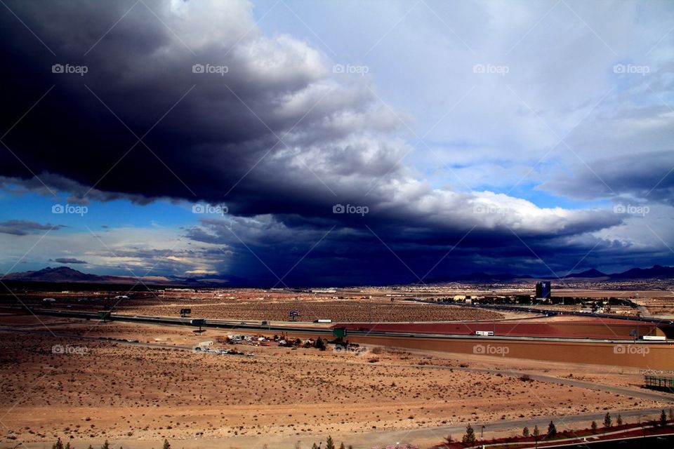 Cloudy sky against desert