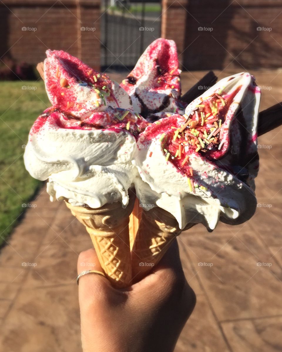 Hands holding ice cream 