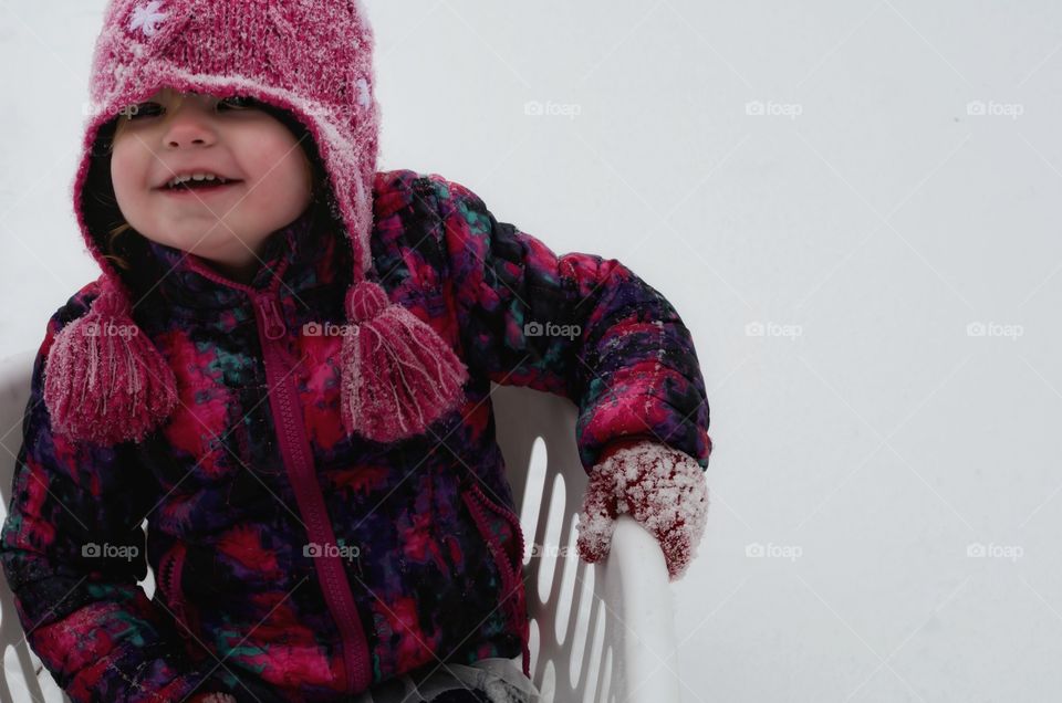 Close-up of cute boy wearing knitted hat