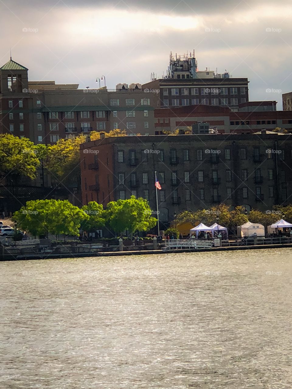 The view of down town Savannah River Street as seen from across the river at the international convention center.