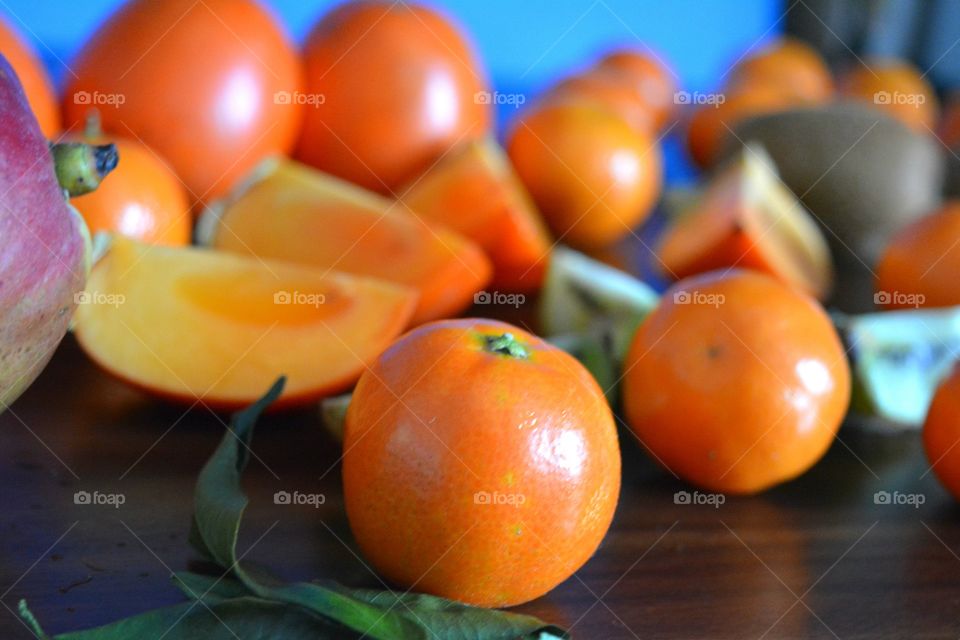 Yellow persimmon fruits