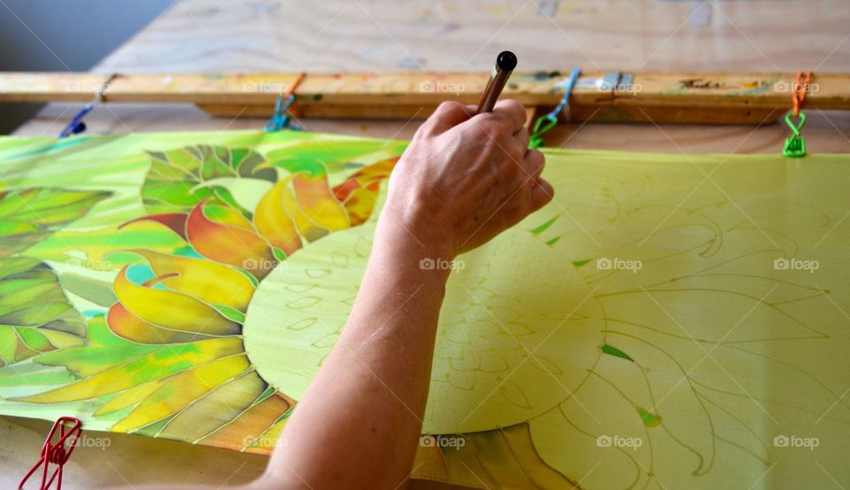 Artist painting on silk