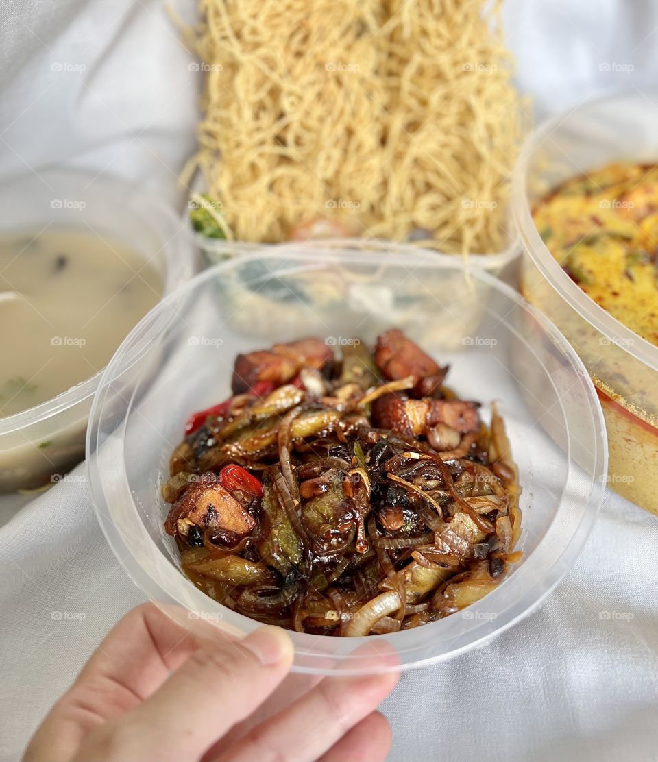 Asian food includes lala clam soup, curry fish head, bitter gourd pork and crispy twin tower noodles 