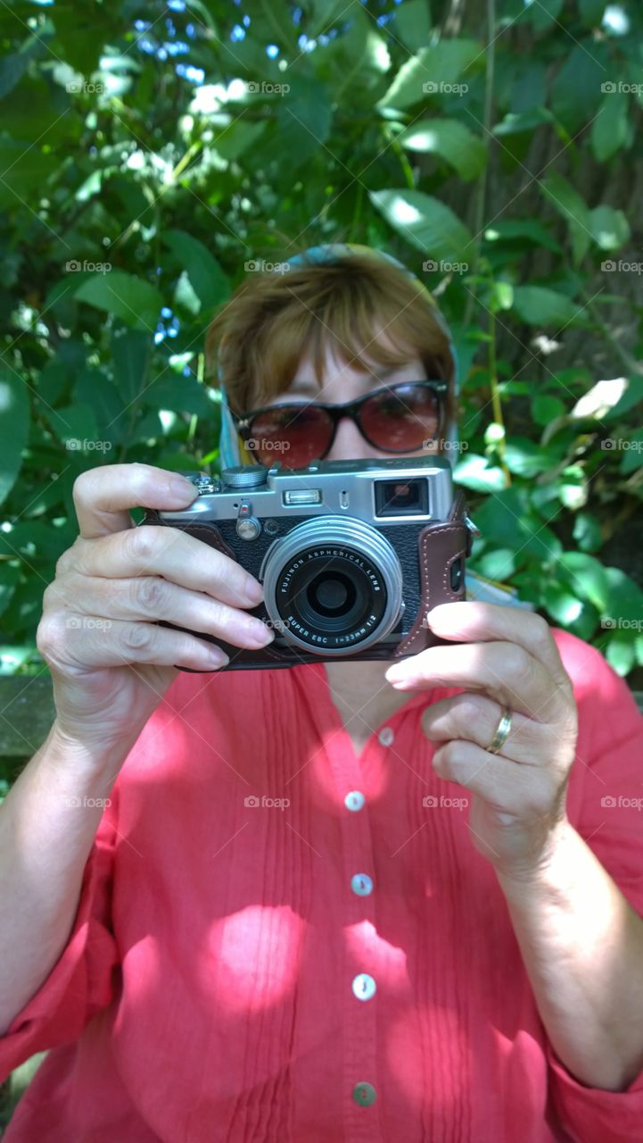 Woman. Woman with camera