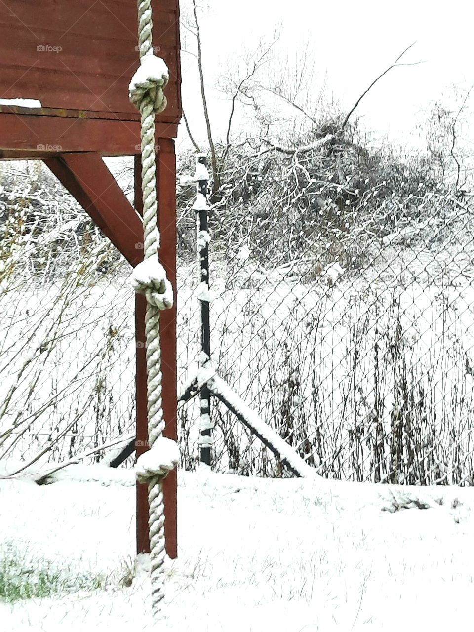 power of three - three knots on a rope in the winter playground