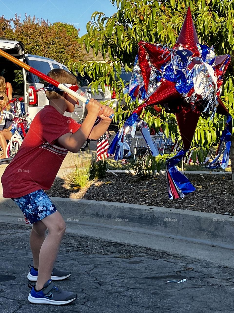 Independence Day Boy Hitting Piñata