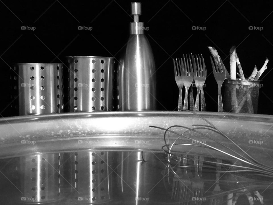 This is my take on city life: buildings made of frigid steel, inanimate trees, modern statues, black sky (air pollution), lifeless reflections in cold water, and dry stalks (deforestation). We are missing the peace and quiet of nature & the countrysi