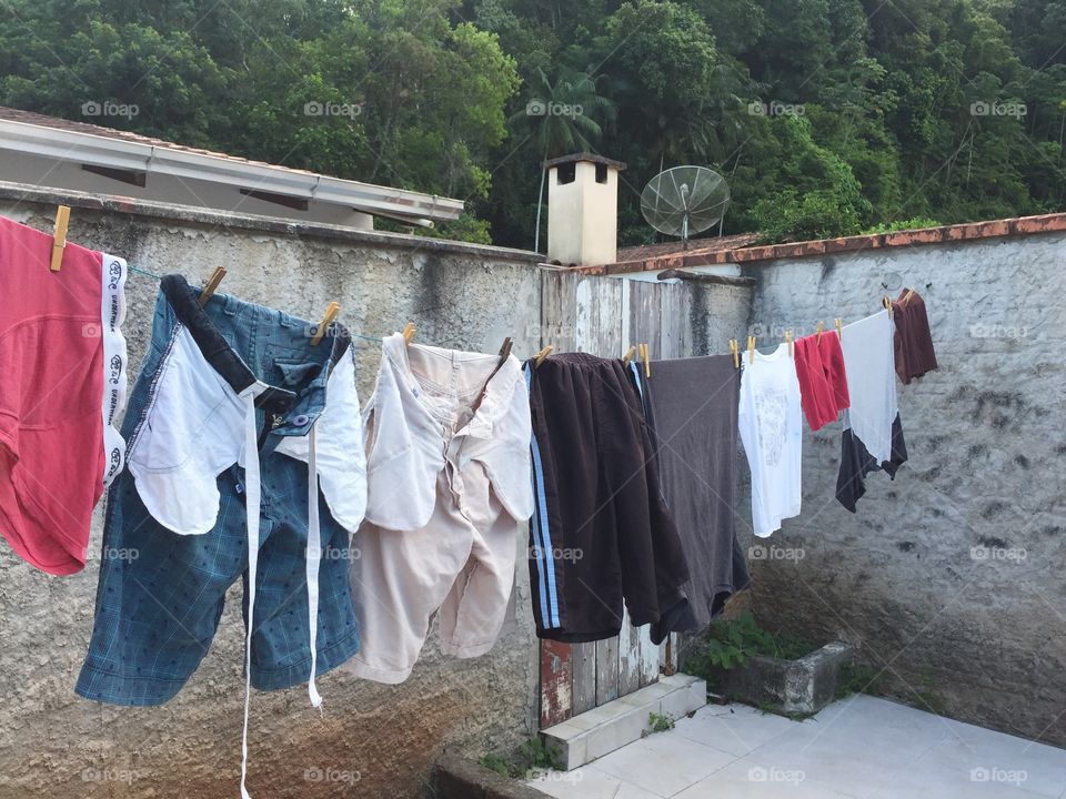 Cloths drying on rope outdoors