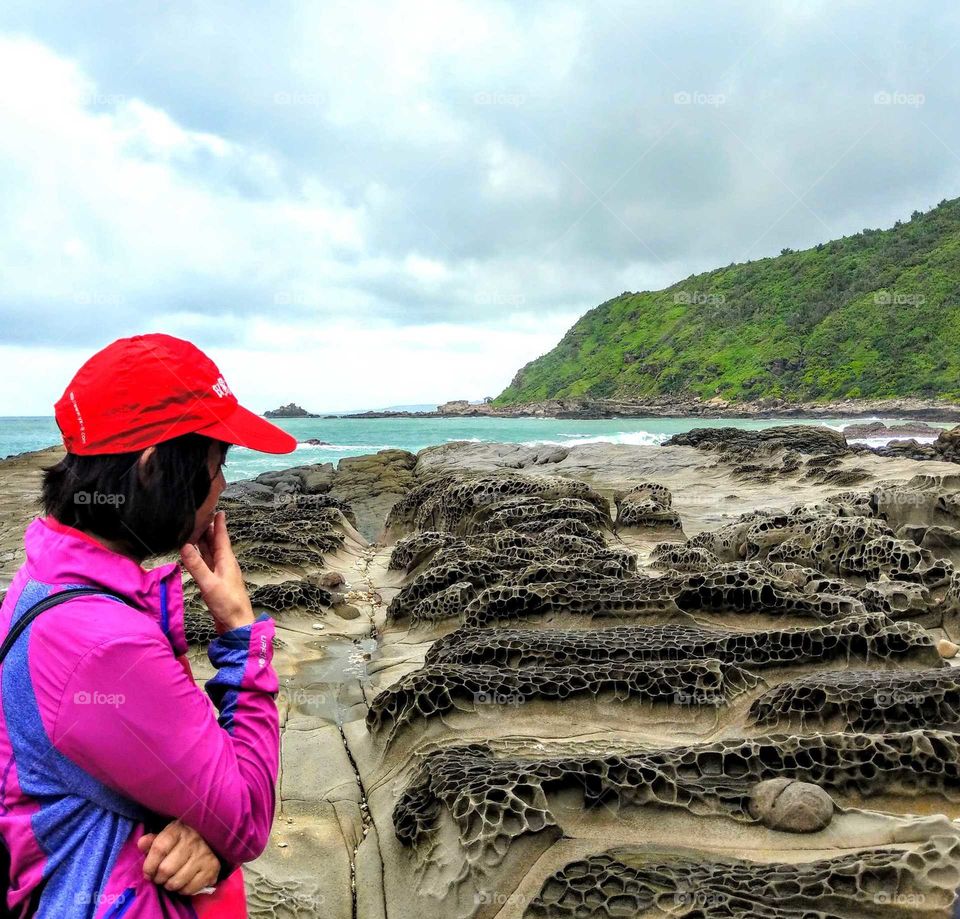 The memories of summer: this was a travel of no road's road, that we walked seaside. watching many honey-comb rocks, very  specil landform and beautiful. an unforgettable memory really.