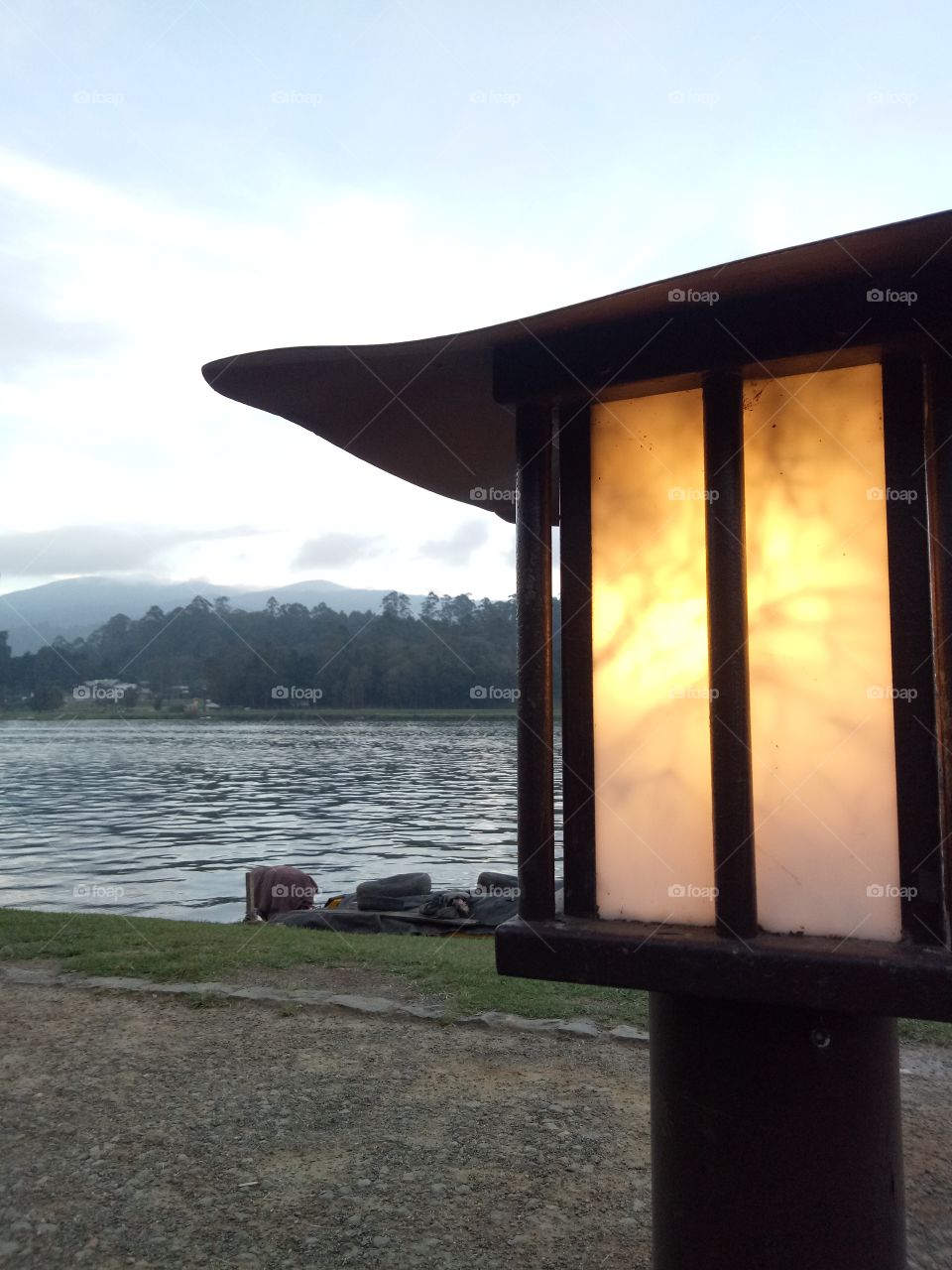 single lamp near the lake