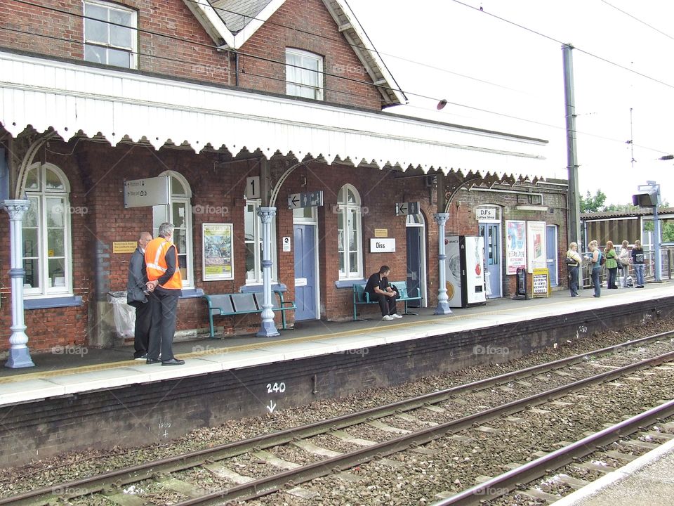People waiting at the train station.
