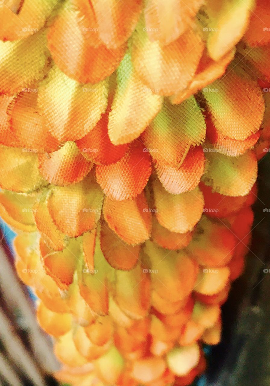 Orange artificial flower