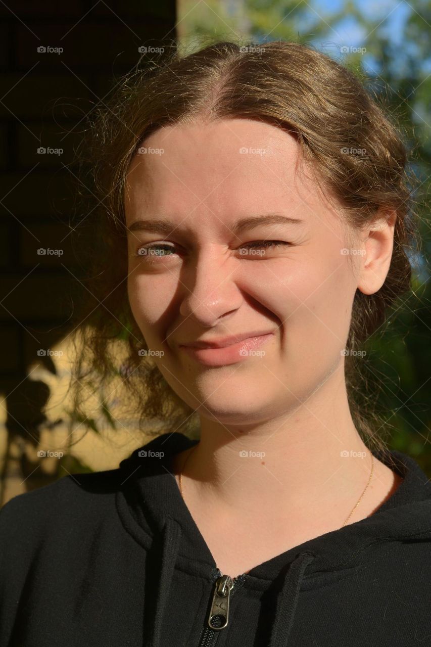 young girl beautiful portrait in sunlight