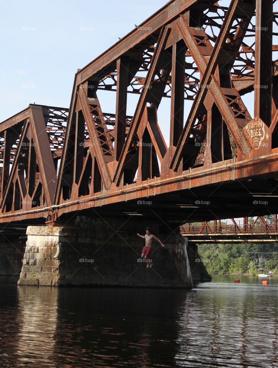 Man jumping in river