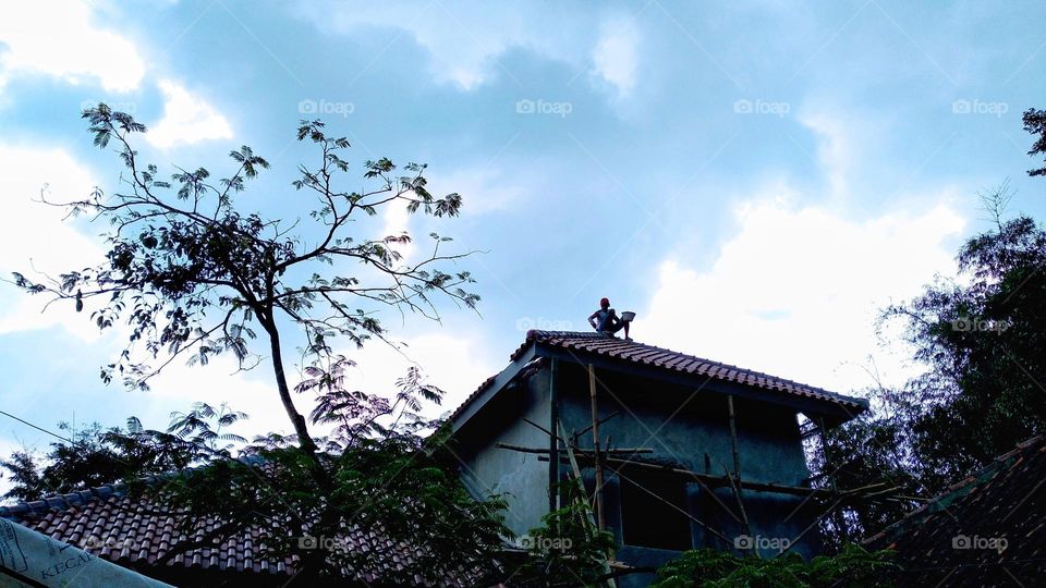 The person above is precarious