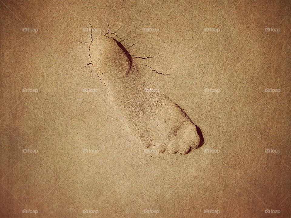 Footprint In The Sand