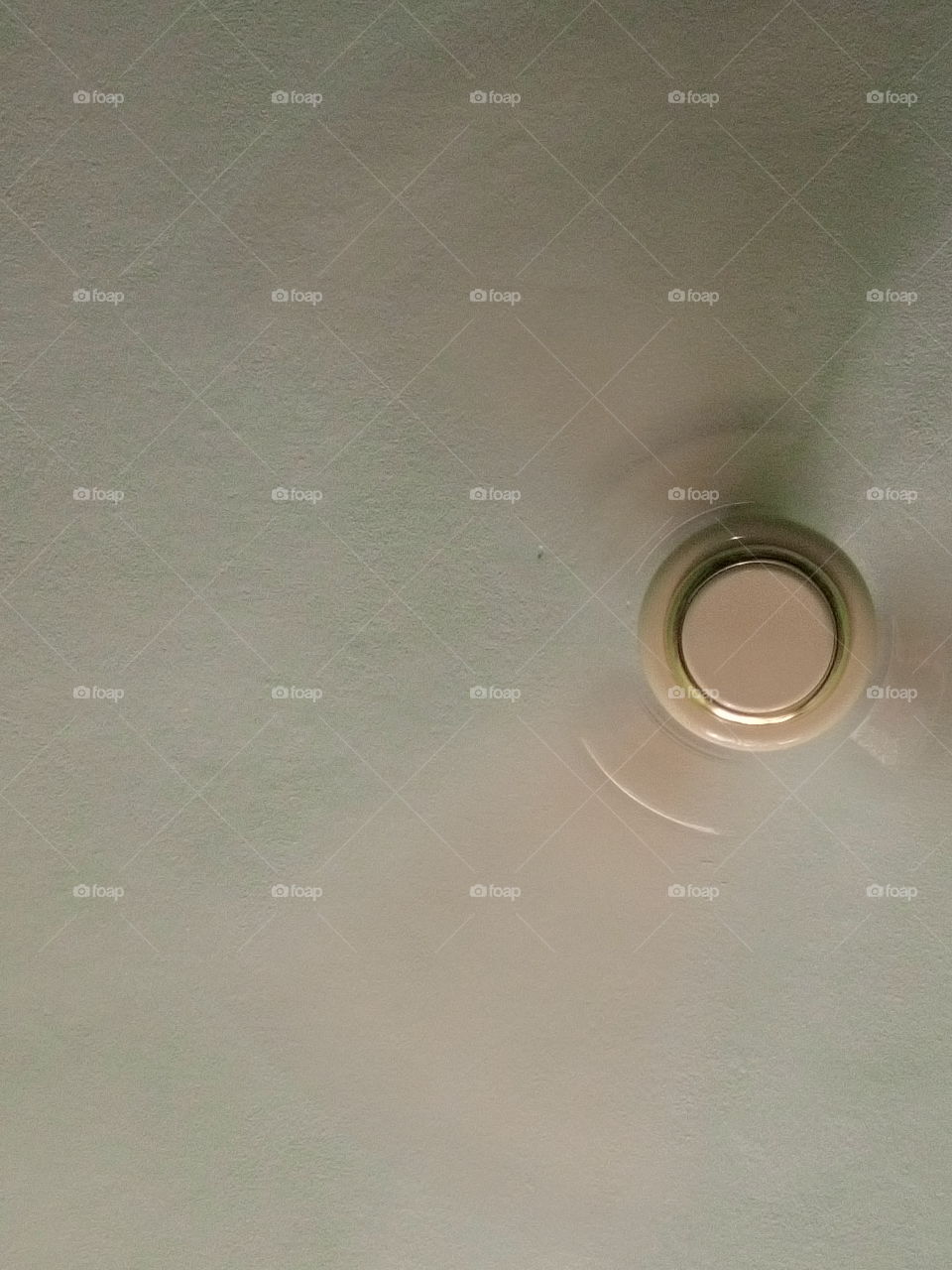 Rotating ceiling fan