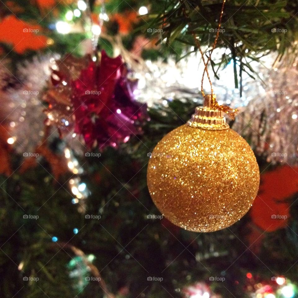 Christmas decoration hanging over tree