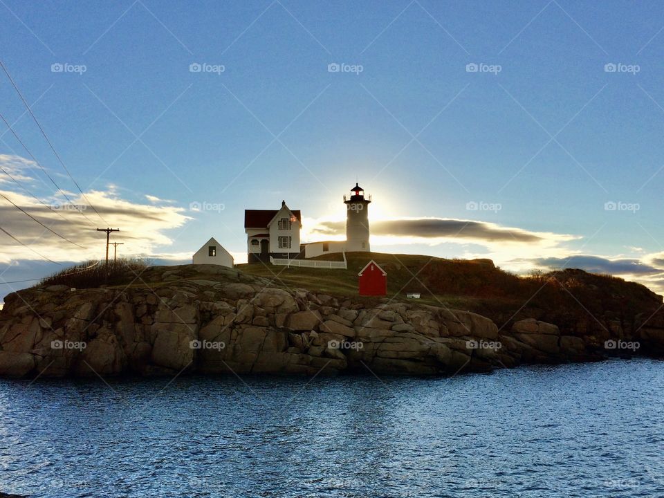 Sunrise in Maine, USA - lighthouse halo