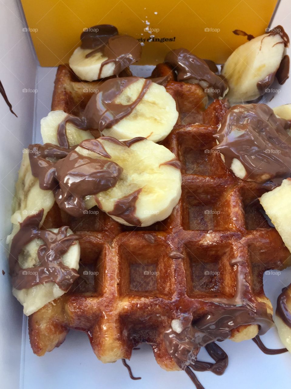 Waffle with banana and chocolate 