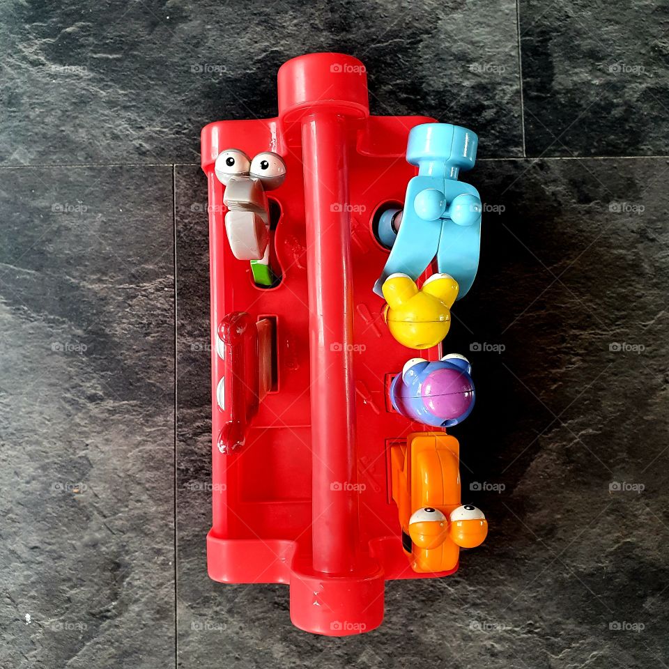 Awesome toys for young children, tool bag with music. hours of fun . In the Color red.